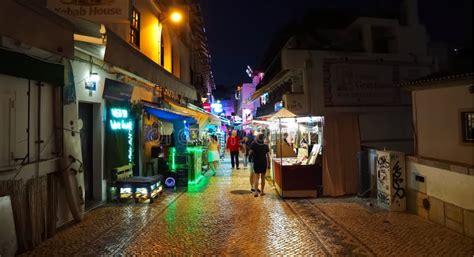 Nightlife in Albufeira at the Algarve in Portugal with Illuminated Bars Clubs and Restaurants ...