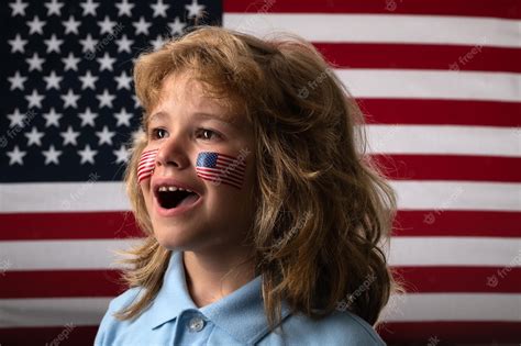 Premium Photo | Child with american flag independence day th of july united states of america ...