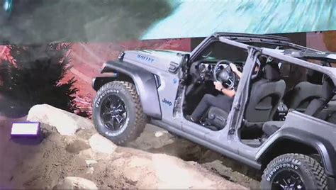 Jeep, Chevy showcase electric vehicle offerings at Detroit Auto Show ...