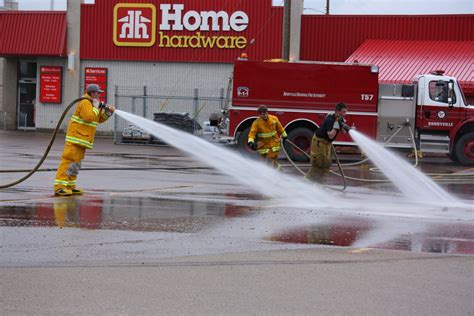 Fireman Hose Washing Firetruck Free Stock Photo - Public Domain Pictures