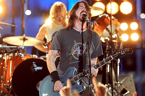 Dave Grohl Jams with Rick Springfield, QOTSA for Documentary