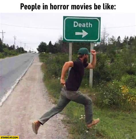 People in horror movies be like running towards death sign | StareCat.com