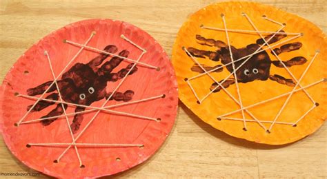 Halloween Kids Craft: Handprint Spiders in a DIY Lacing Card Web