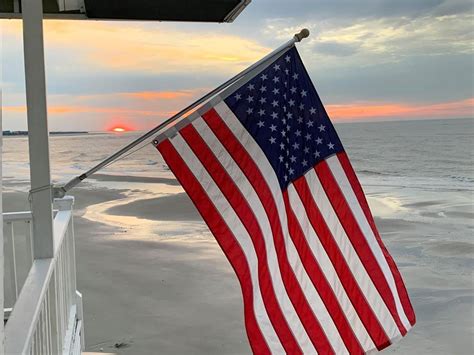 Flag beach ocean sea shore coast patriotism USA stars stripes seashore ...