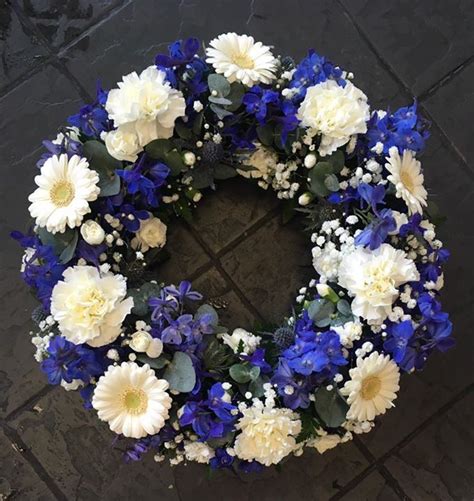 Royal Blue Funeral Wreath | Flower wreath funeral, Casket flowers ...