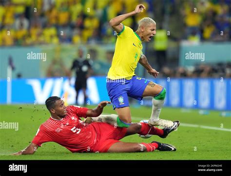 Switzerland's Manuel Akanji challenges Brazil's Richarlison during the ...