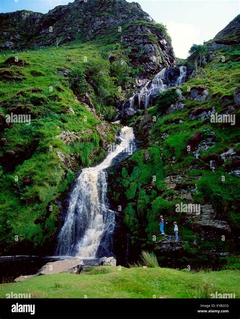 Maghera Waterfall, Maghera, Co Donegal, Ireland; Children Standing At ...