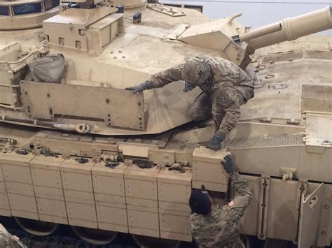 Army Unit Bolsters Abrams Tanks With 'Reactive' Armor > U.S. DEPARTMENT OF DEFENSE > Article