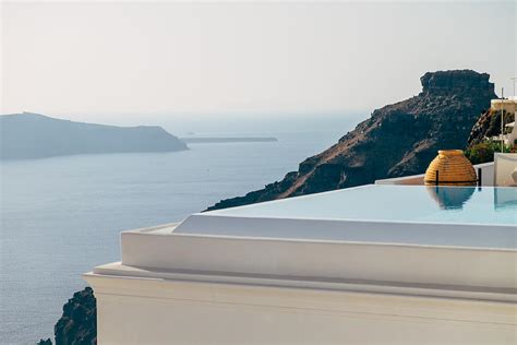 Infinity pool santorini - Greece Photograph by Daniel Pazmany - Pixels