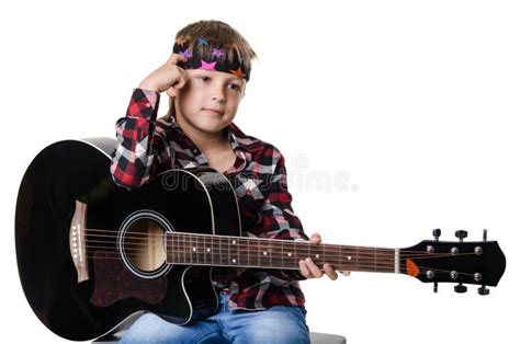 2,314 Young Boy Holding Guitar Stock Photos - Free & Royalty-Free Stock ...