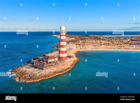 Morning sun over the lighthouse of Ocean Cay Bahamas Island Stock Photo ...