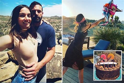 Ben Affleck and Ana de Armas enjoy cuddles and cake while celebrating ...