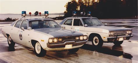 Seattle Police officers patrolled in Plymouth Satellites such as these from 1971 and 1970 ...