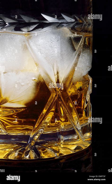 Whiskey on the rocks Stock Photo - Alamy