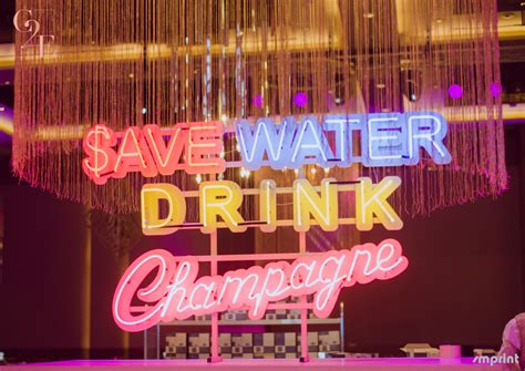 Photo of neon bar decor with saying