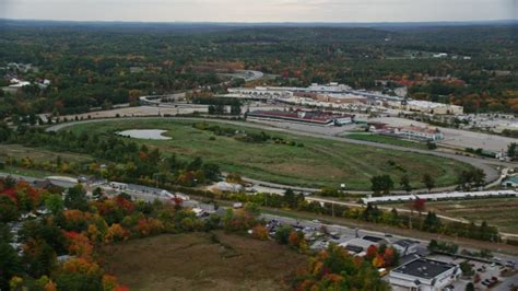 Flying by Rockingham Park, colorful foliage in autumn, overcast, Salem ...