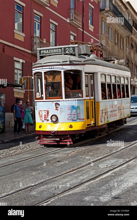 Typical Lisbon tram in Alfama District. Lisbon, Portugal Stock Photo ...