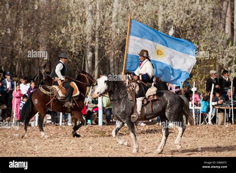 A Gaucho with Argentinian flag riding a horse in exhibitions for Argentina 200 hundreds years ...