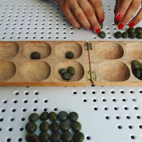 The Ancient Game Of Mancala Explained | Journo Travel Journal