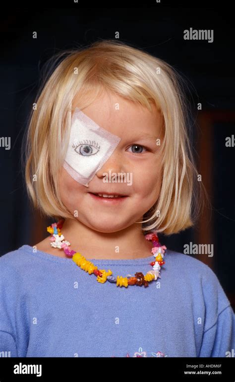 The girl had to wear an eye-patch so her father made her a new eye Stock Photo - Alamy