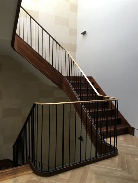 WALNUT STAIRS WITH BRONZE HANDRAIL AND IRON BALUSTERS | HL Stairs | Custom Handcrafted ...