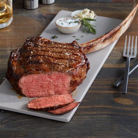 Sure to provide a jaw dropping experience, this long-bone Tomahawk steak is one of the most ...