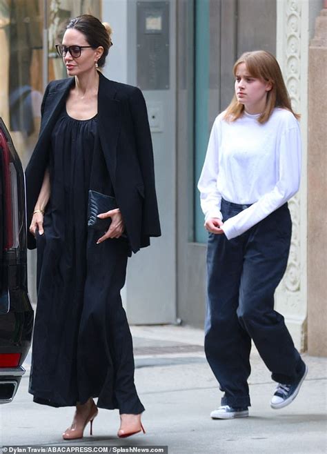 A nepo baby is born! Angelina Jolie looks chic in all-black as she steps out with daughter ...