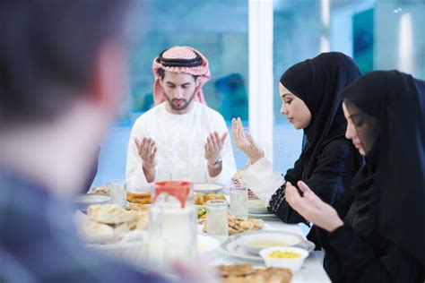 Traditional Muslim Family Praying before Iftar Dinner Stock Image - Image of islam, hands: 180077989