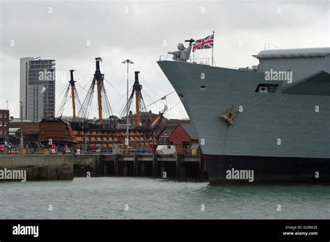 HMS Illustrious in Portsmouth for decommissioning opposite HMS Victory ...