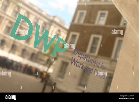 DWP Department for Work and Pensions government entrance sign building in Whitehall London Stock ...