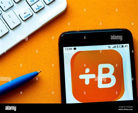 In this photo illustration e-commerce Babbel logo is seen displayed on a smartphone Stock Photo ...