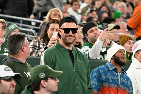 Travis Kelce sports green tracksuit to cheer on Eagles without Taylor Swift