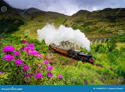 Glenfinnan Railway Viaduct in Scotland with a Steam Train in the Spring ...