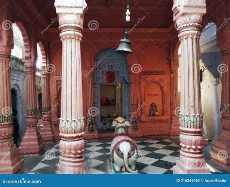 Varanasi, India: Interior of a Hindu Temple with Pillars, Stone Diety Bull Nandi and Bell ...