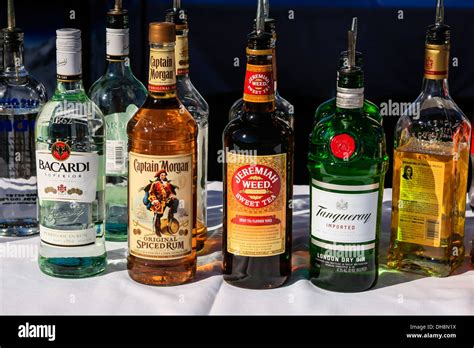 Bottles of hard liquor - Whiskey, Rum, Vodka Stock Photo, Royalty Free ...