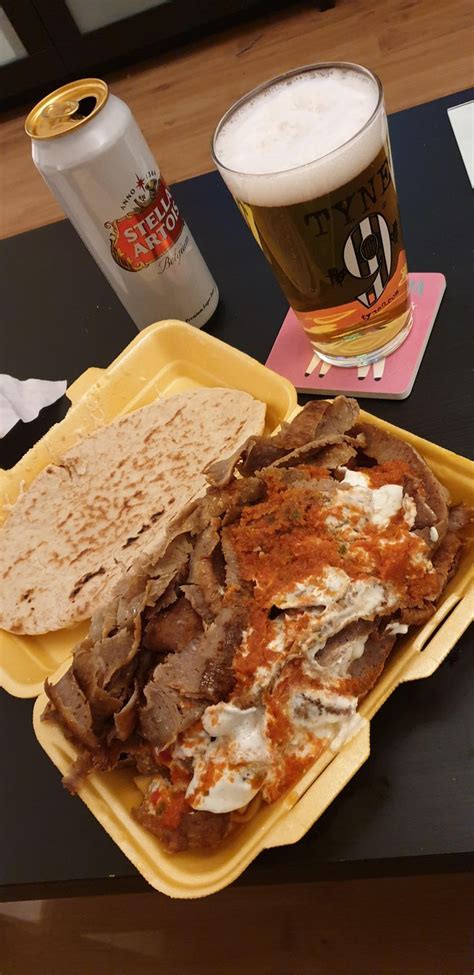 [I Ate] Doner kebab with chips in a pita topped with chilli and garlic Sauces. Filthy but ...