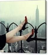 Two-Color Pumps Beside the New York City Skyline Art Print by Edward Kasper - Conde Nast