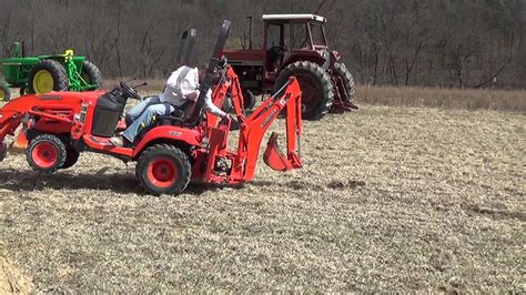 kubota bx-24 4x4 with loader and backhoe - YouTube