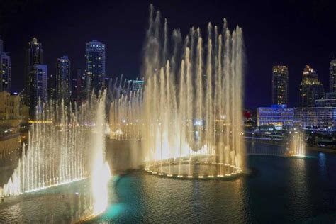 Dubai: Fountain Show and Burj Lake Ride by Traditional Boat | GetYourGuide