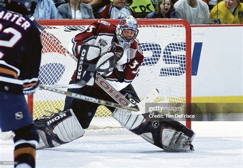 Colorado Avalanche goalie Patrick Roy in action, making save during ...