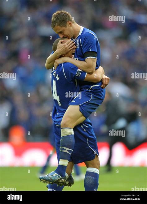 Everton's Phil Jagielka (right) celebrates scoring the winning penalty ...