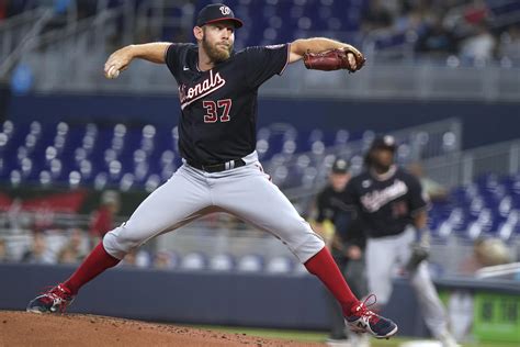 Nats' Stephen Strasburg has rib injury, will see specialist | AP News