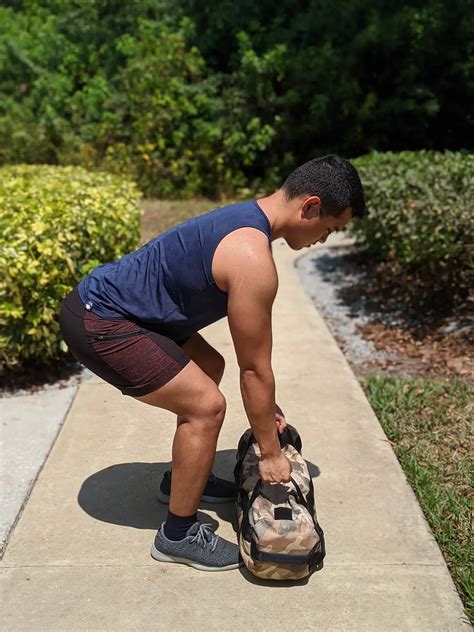 The Beginner Full-Body Sandbag Workout Routine - The Modest Man