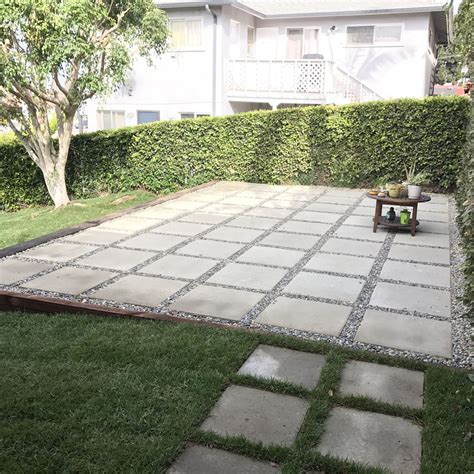 Large pavers used to create patio in backyard. Quick and easy alternative to building a full ...