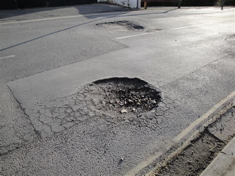 Have You Experienced Pothole Damage To Your Car?