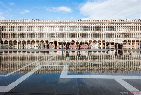 - Tourists in St Mark's square flooded, Venice | Royalty Free Image