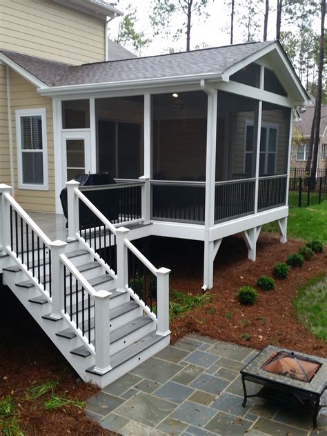 Classic Screened Porch with Trex Deck and Bluestone Patio — DeckScapes