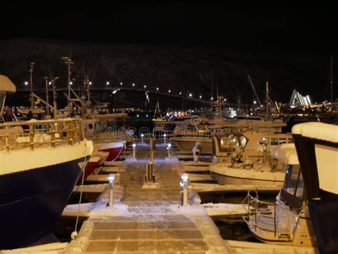 Port of Tromso at Night - Bridge, Arctic Cathedral and Boats - Norwegian Winter Holidays Stock ...