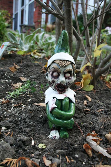 Zombie Garden Gnomes Are a Perfect Way To Keep Everyone From Your Lawn