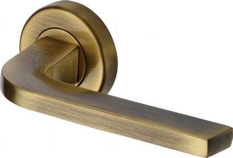 Heritage Brass Door Handle Lever on Rose Bellagio Design Antique ...